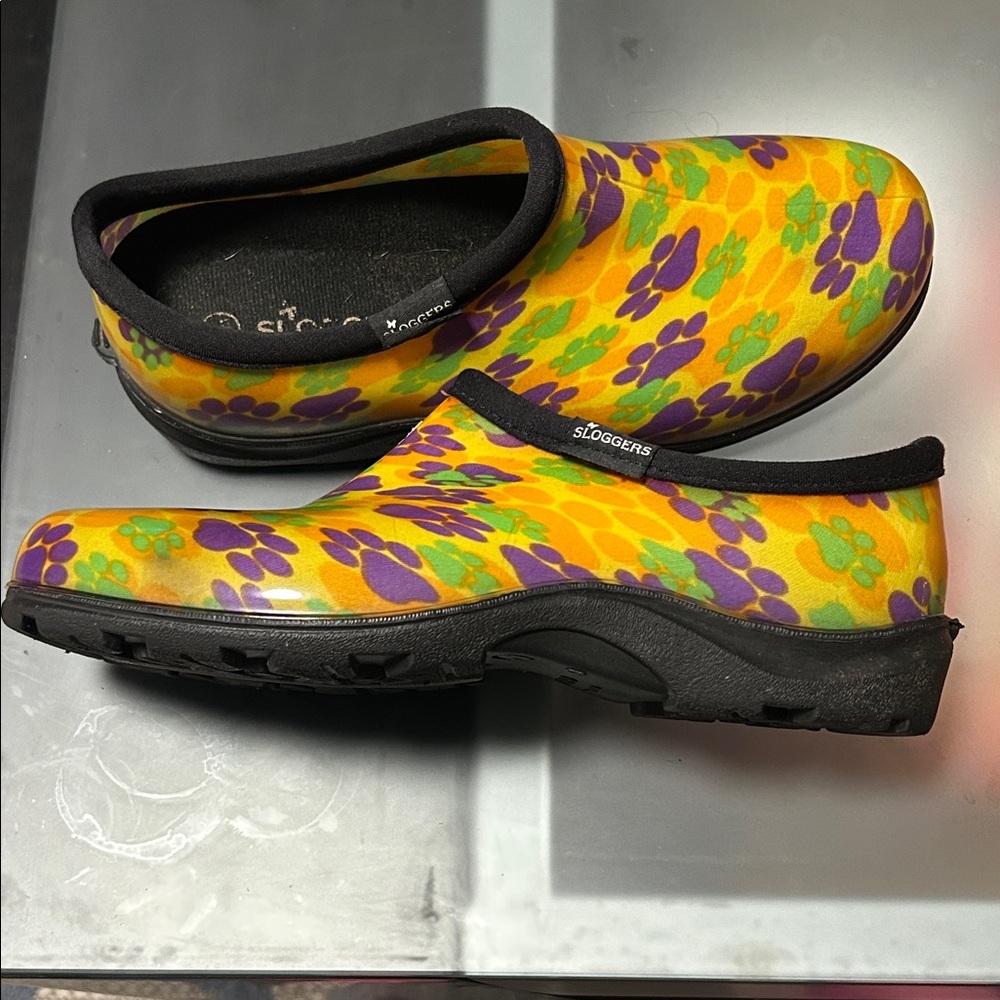 Sloggers Vibrant Yellow Clogs with Purple and Green Paw Prints - Picture 5 of 10